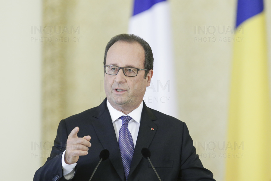 French President Francois Hollande delivers a speech during a joint press conference with Romanian President Klaus Iohannis
